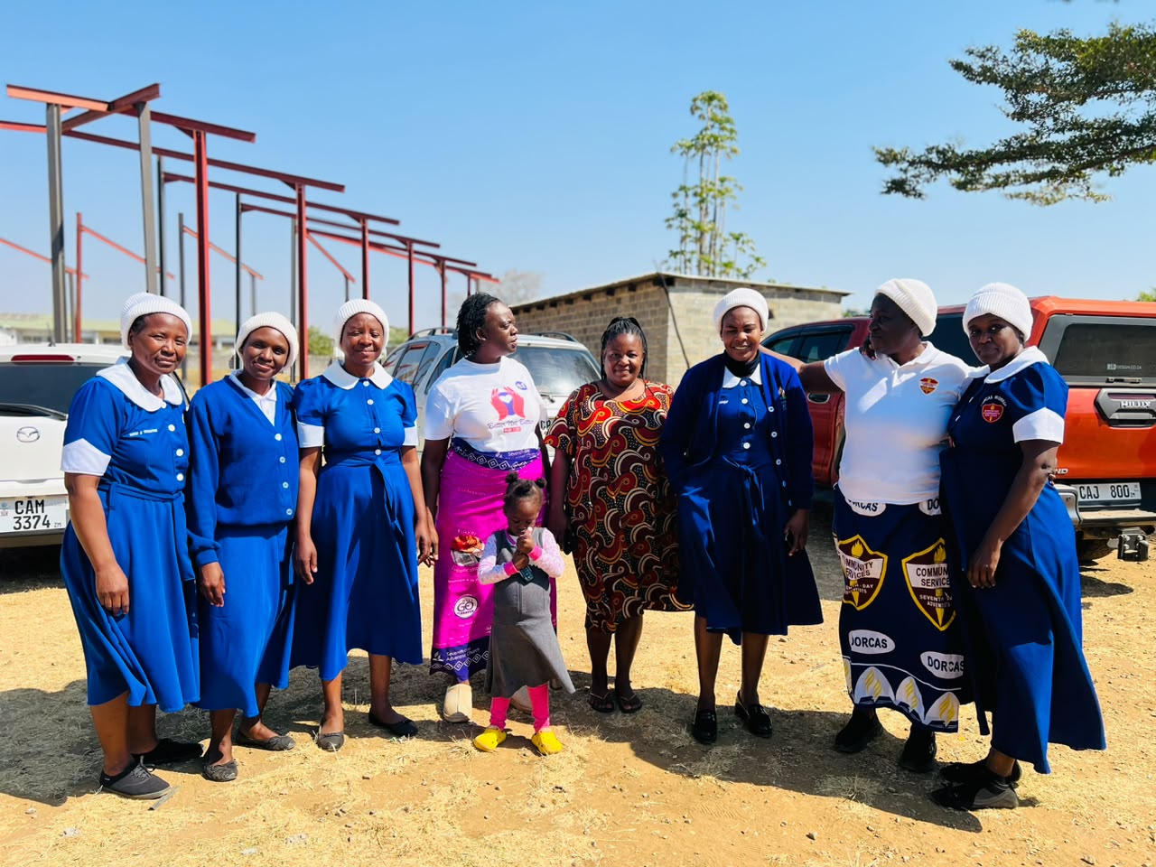 A group of women gathered together in fellowship and prayer